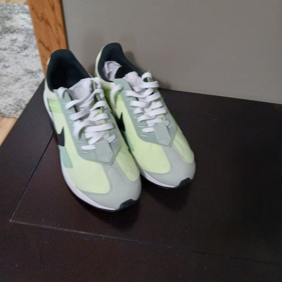 nike black and neon green sneakers